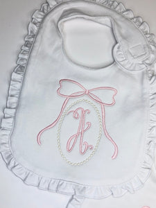 White Ruffle Bib with Initial Bow Frame